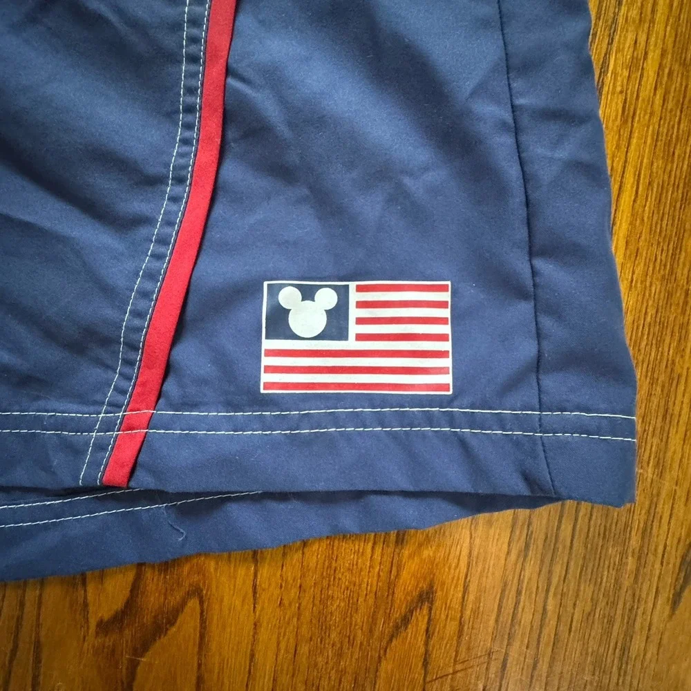 Disney Store Blue Red Mickey Mouse USA Flag Mesh Lined Swim Trunks Men's Size XL